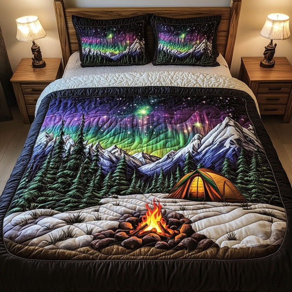 Campfire Dreams quilted 3-piece bedding set on a made bed with two matching pillow shams