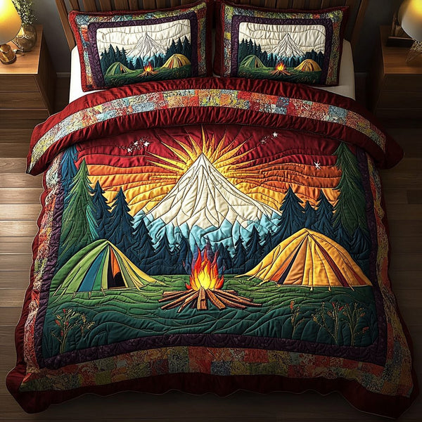 Campfire Nights quilted 3-piece bedding set on a made bed with two matching pillow shams
