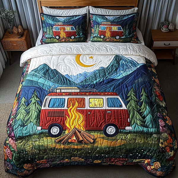 Campfire Tales quilted 3-piece bedding set on a made bed with two matching pillow shams