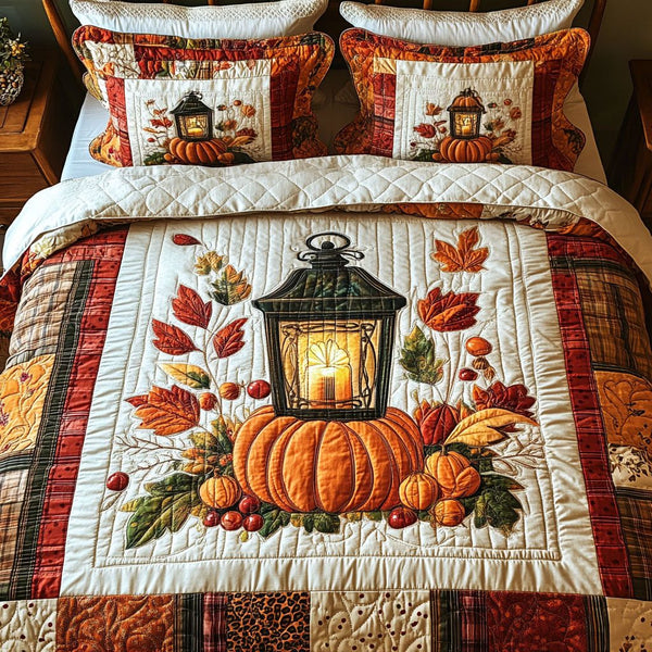 Candlelit Autumn quilted 3-piece bedding set on a made bed with two matching pillow shams