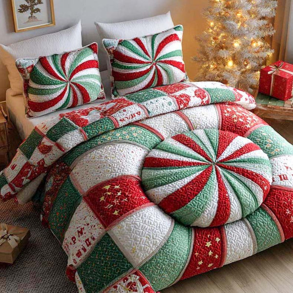 Candy Swirl Delight quilted 3-piece bedding set on a made bed with two matching pillow shams
