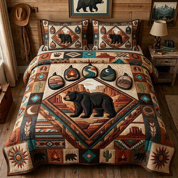 Canyon Bear Camp quilted 3-piece bedding set on a made bed with two matching pillow shams