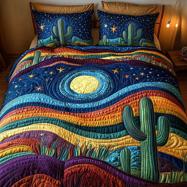 Canyon Dream quilted 3-piece bedding set on a made bed with two matching pillow shams