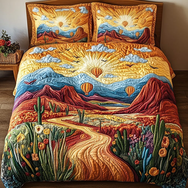 Canyon Float quilted 3-piece bedding set on a made bed with two matching pillow shams