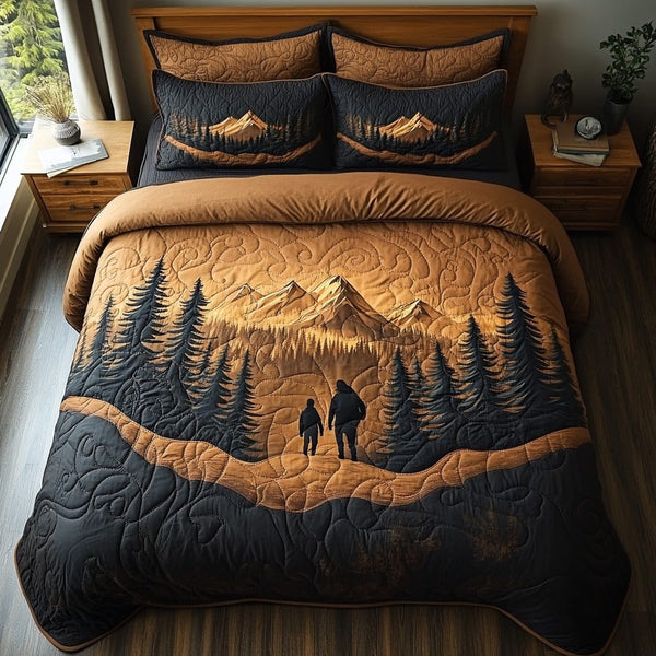 Canyon Quest quilted 3-piece bedding set on a made bed with two matching pillow shams