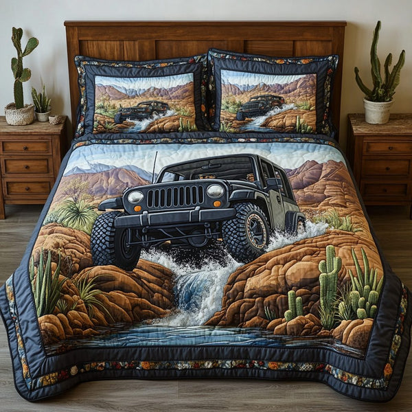 Canyon Ride quilted 3-piece bedding set on a made bed with two matching pillow shams