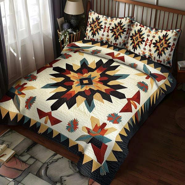 Canyon Sunrise quilted 3-piece bedding set on a made bed with two matching pillow shams