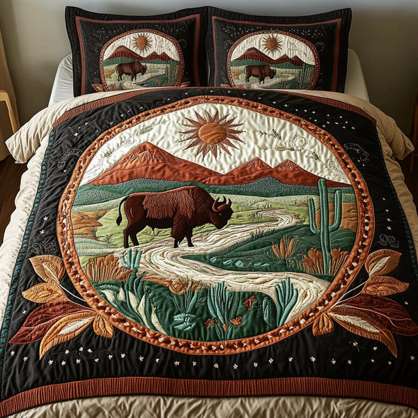 Canyon Trail quilted 3-piece bedding set on a made bed with two matching pillow shams
