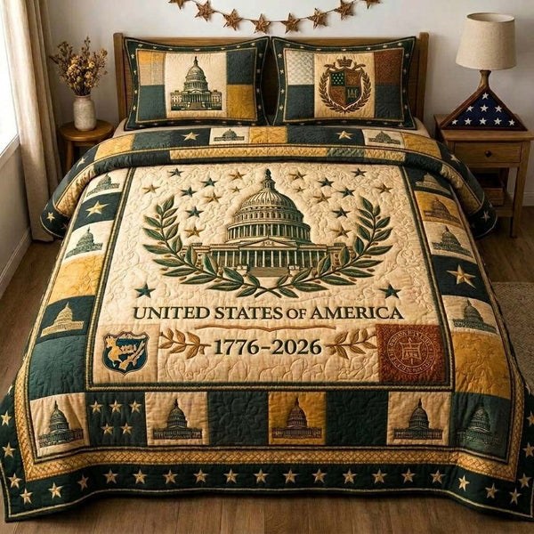 Capitol Legacy Pride quilted 3-piece bedding set on a made bed with two matching pillow shams