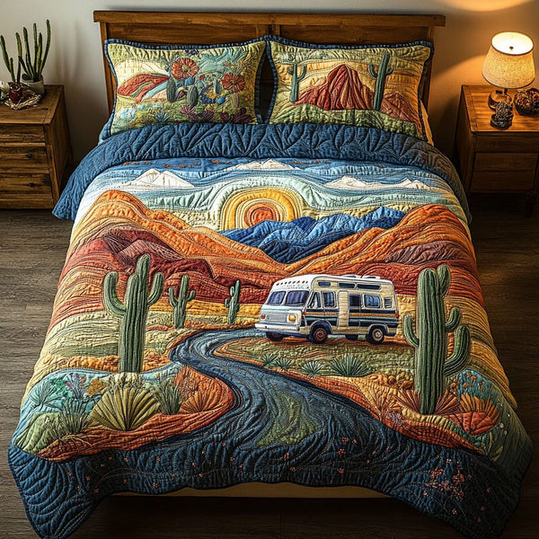 Caravan Chronicles quilted 3-piece bedding set on a made bed with two matching pillow shams