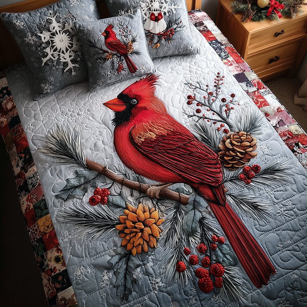 Cardinal Berry Blessing quilted 3-piece bedding set on a made bed with two matching pillow shams