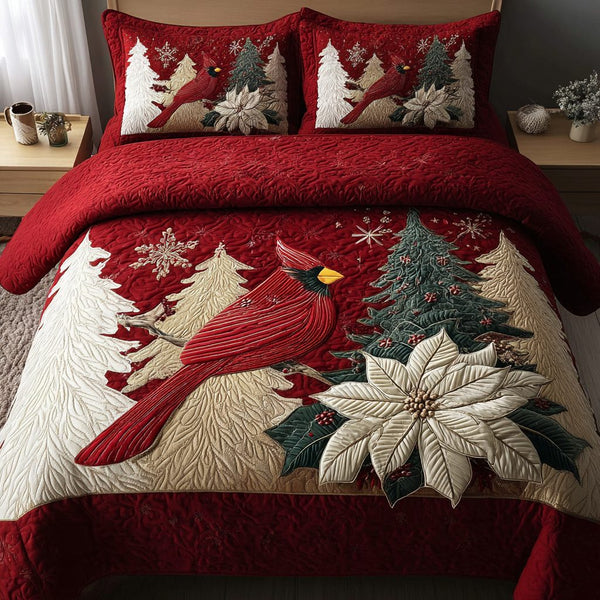 Cardinal Blessing quilted 3-piece bedding set on a made bed with two matching pillow shams