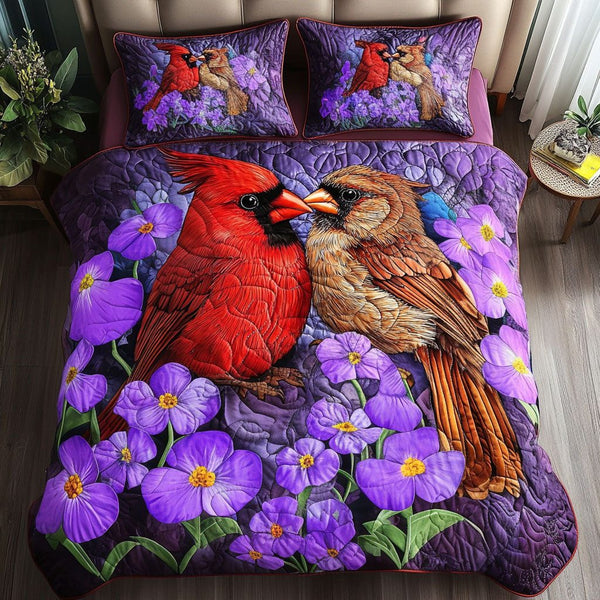 Cardinal Bliss quilted 3-piece bedding set on a made bed with two matching pillow shams