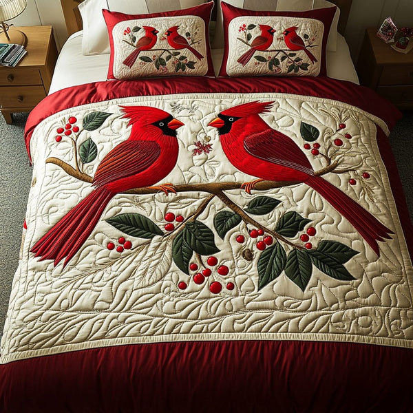 Cardinal Bloom quilted 3-piece bedding set on a made bed with two matching pillow shams