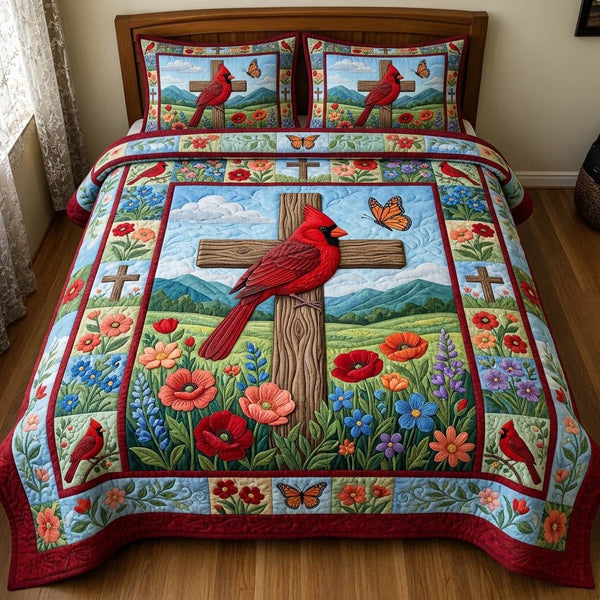 Cardinal Christian quilted 3-piece bedding set on a made bed in a softly lit bedroom