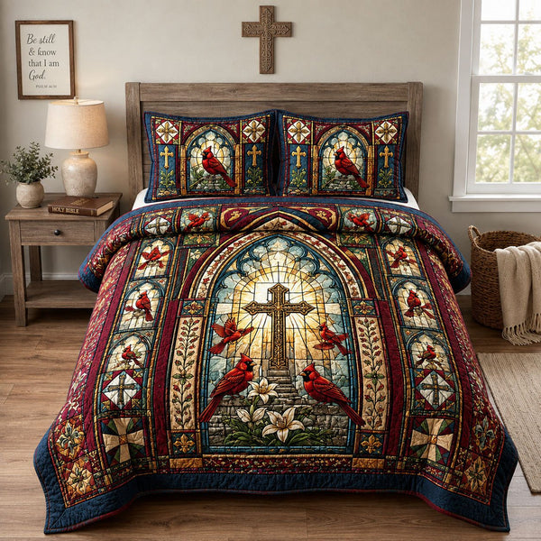 Cardinal Cross Faith quilted 3-piece bedding set on a made bed in a softly lit bedroom