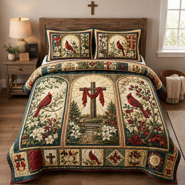 Cardinal Cross Garden quilted 3-piece bedding set on a made bed in a softly lit bedroom