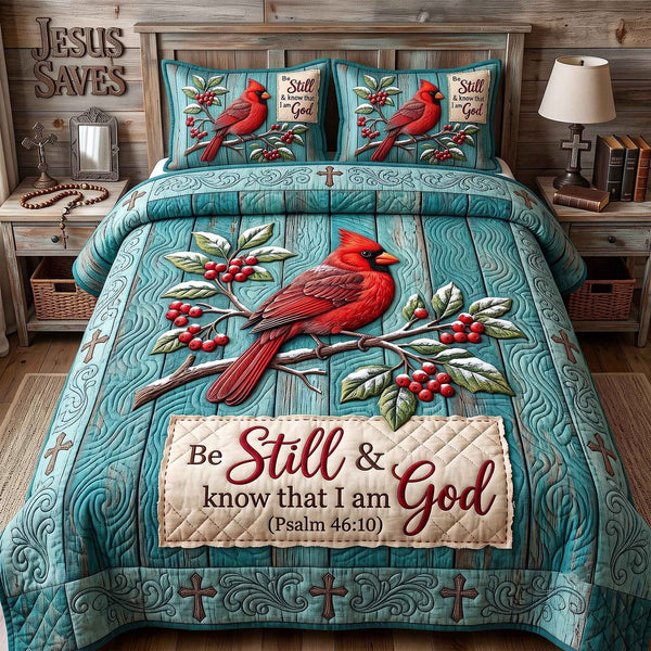 Cardinal Faith quilted 3-piece bedding set on a made bed in a softly lit bedroom