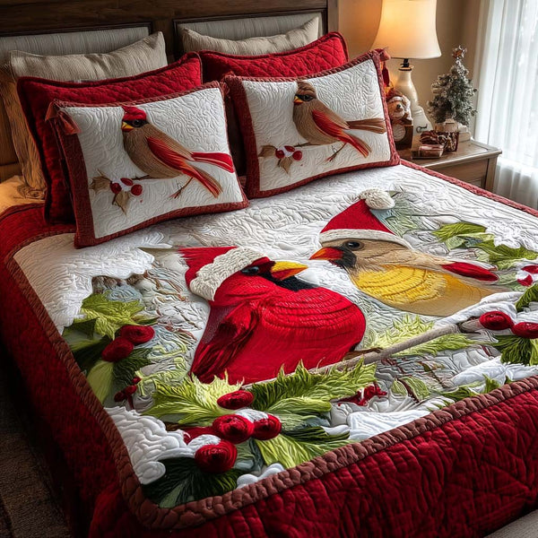 Cardinal Glow quilted 3-piece bedding set on a made bed with two matching pillow shams