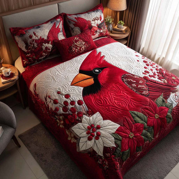 Cardinal Glow quilted 3-piece bedding set on a made bed with two matching pillow shams