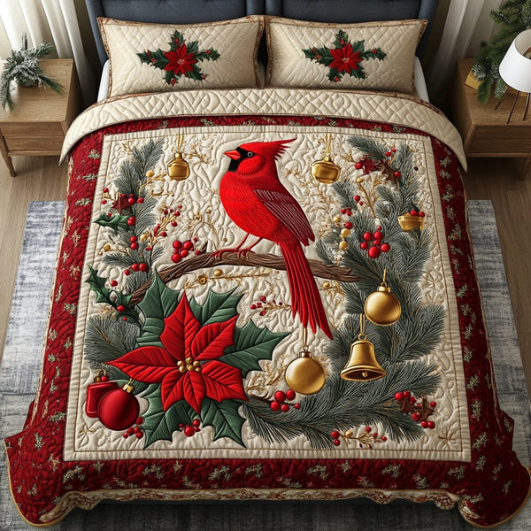 Cardinal Joy quilted 3-piece bedding set on a made bed with two matching pillow shams