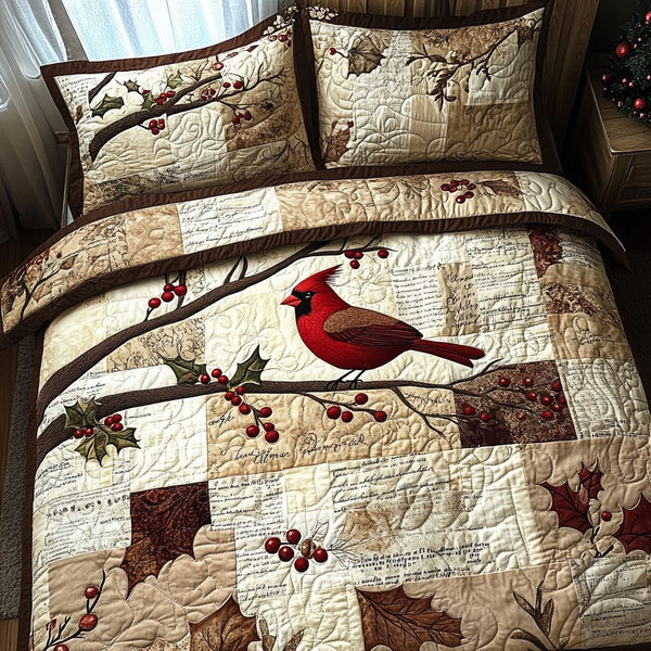 Cardinal Letters quilted 3-piece bedding set on a made bed with two matching pillow shams