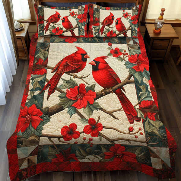 Cardinal Love quilted 3-piece bedding set on a made bed with two matching pillow shams
