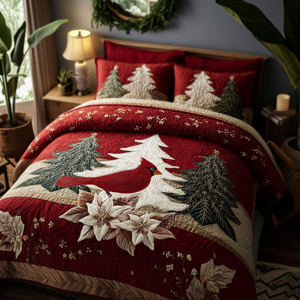 Cardinal Meadow quilted 3-piece bedding set on a made bed with two matching pillow shams