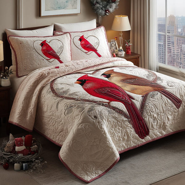 Cardinal Meadow quilted 3-piece bedding set on a made bed with two matching pillow shams