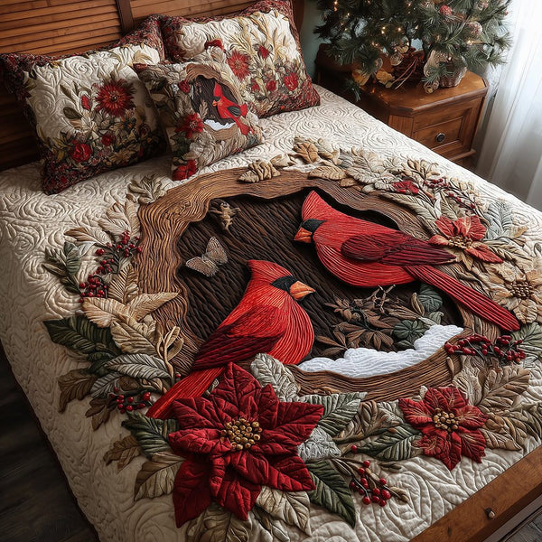 Cardinal Nest Haven quilted 3-piece bedding set on a made bed with two matching pillow shams