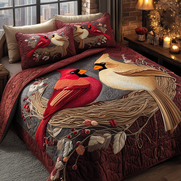 Cardinal Nest quilted 3-piece bedding set on a made bed with two matching pillow shams