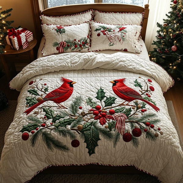 Cardinal Whispers quilted 3-piece bedding set on a made bed with two matching pillow shams