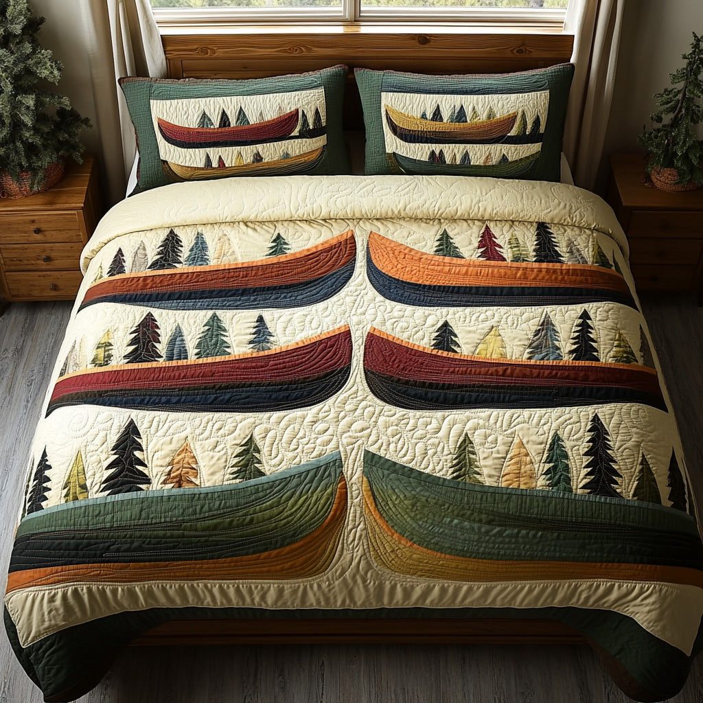 Cascade Voyage quilted 3-piece bedding set on a made bed with two matching pillow shams