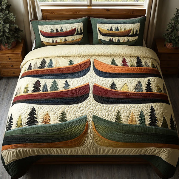 Cascade Voyage quilted 3-piece bedding set on a made bed with two matching pillow shams