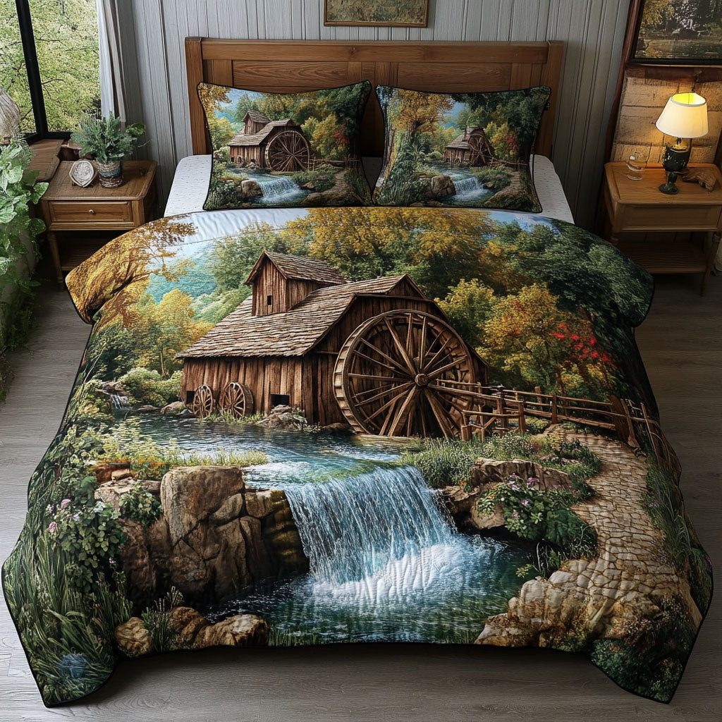 Cascading Mill Creek quilted 3-piece bedding set on a made bed with two matching pillow shams