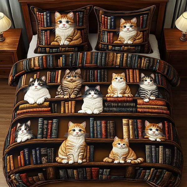 Cat Chronicles quilted 3-piece bedding set on a made bed with two matching pillow shams