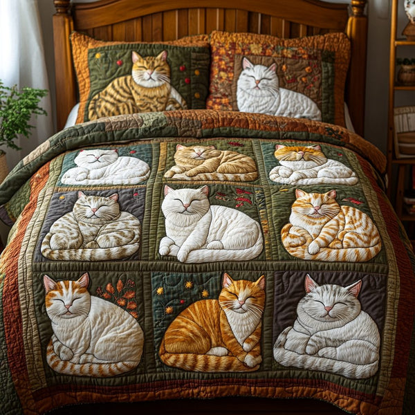 Cat Haven quilted 3-piece bedding set on a made bed with two matching pillow shams