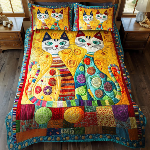 Cat Nap quilted 3-piece bedding set on a made bed with two matching pillow shams