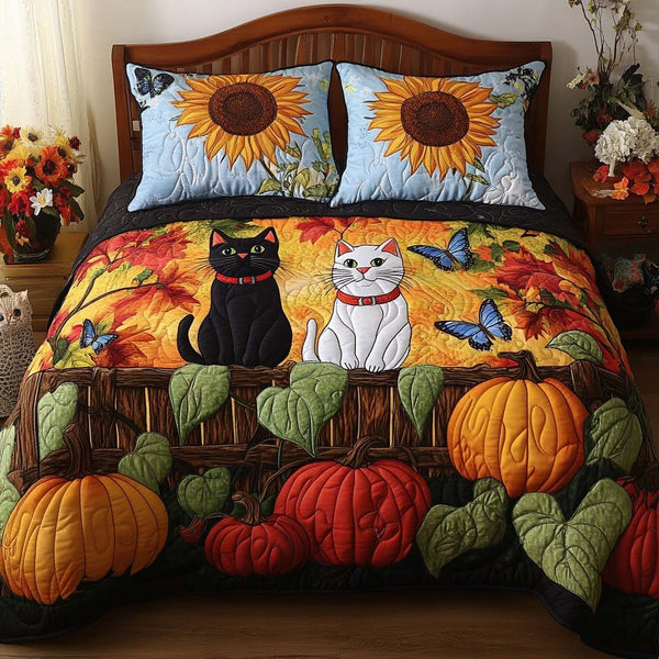Cat Pumpkin Patch quilted 3-piece bedding set on a made bed against a dark styled interior