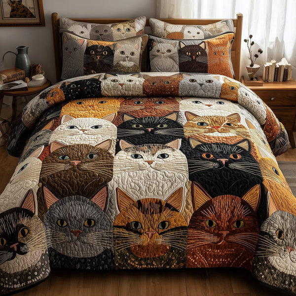 Cat quilted 3-piece bedding set on a made bed with two matching pillow shams