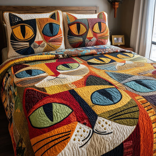 Cat quilted 3-piece bedding set on a made bed with two matching pillow shams