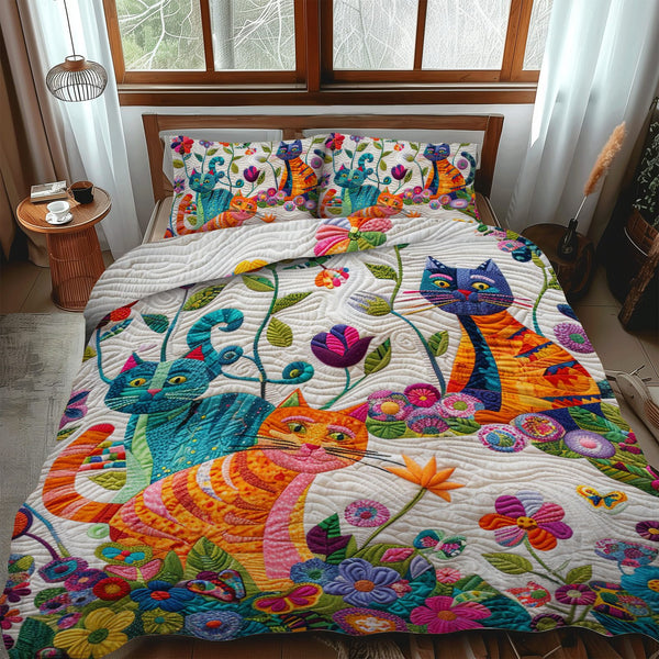 Cat quilted 3-piece bedding set on a made bed with two matching pillow shams