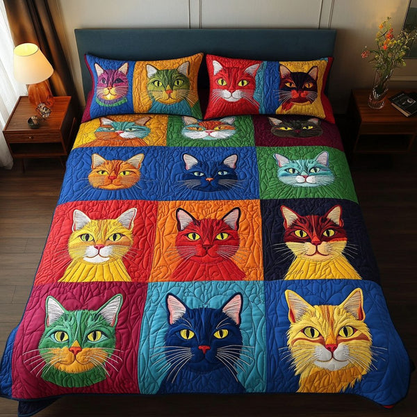 Cat Whiskers quilted 3-piece bedding set on a made bed with two matching pillow shams