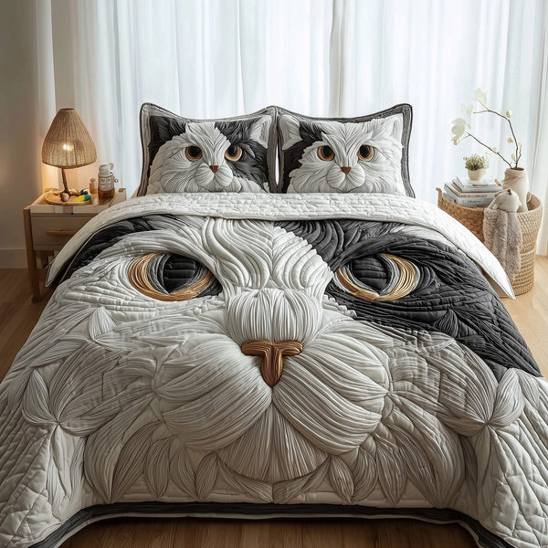 Catitude quilted 3-piece bedding set on a made bed with two matching pillow shams