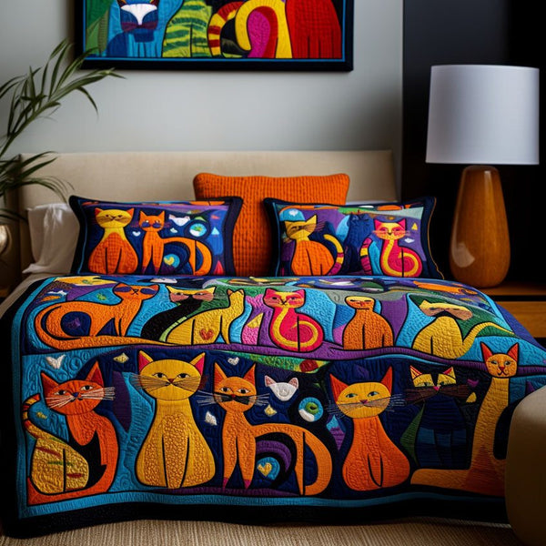 Catnap Kingdom quilted 3-piece bedding set on a made bed with two matching pillow shams