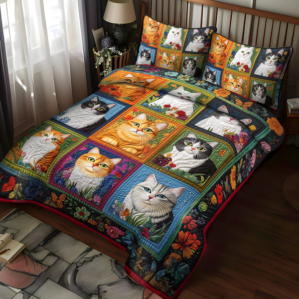 Cattitude Chic quilted 3-piece bedding set on a made bed with two matching pillow shams