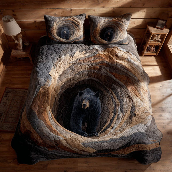 Cave Spirit quilted 3-piece bedding set on a made bed with two matching pillow shams