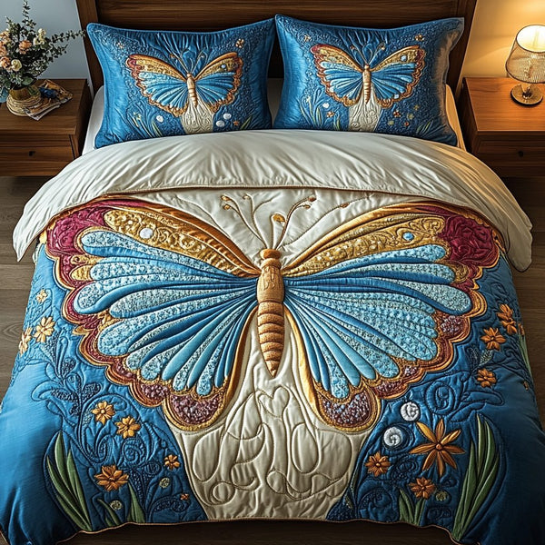 Celestial Bloom quilted 3-piece bedding set on a made bed with two matching pillow shams