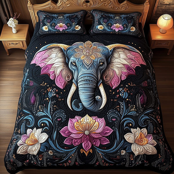 Celestial Elephant Dreams quilted 3-piece bedding set on a made bed with two matching pillow shams