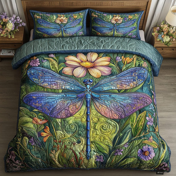 Celestial Flyer quilted 3-piece bedding set on a made bed with two matching pillow shams